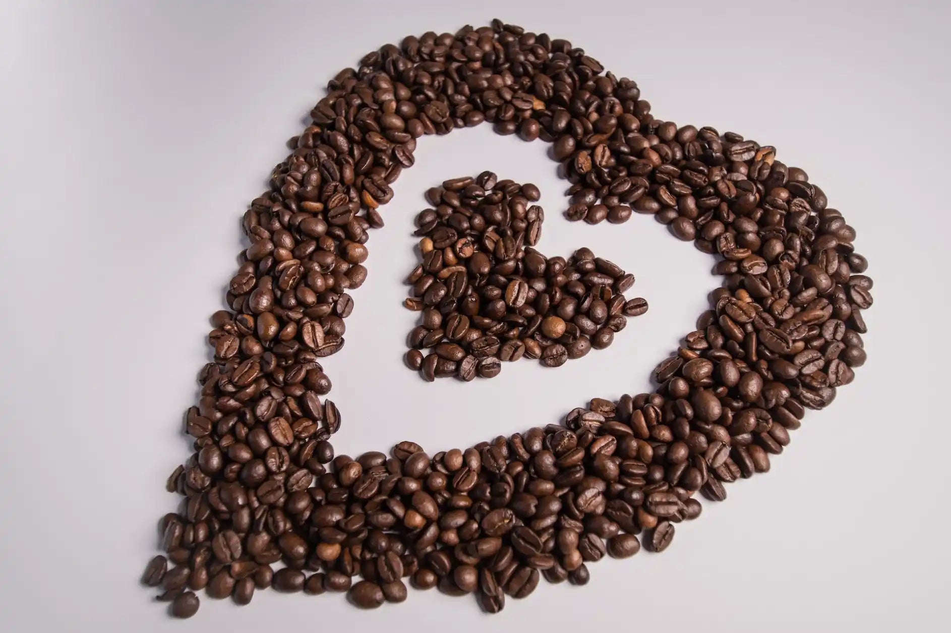 Nespresso kompatible Kapseln - coffee beans shaped like a heart - MyCoffeeCup.de